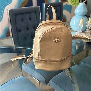 Gold mini Backpack with Dome Top and Smooth Finish